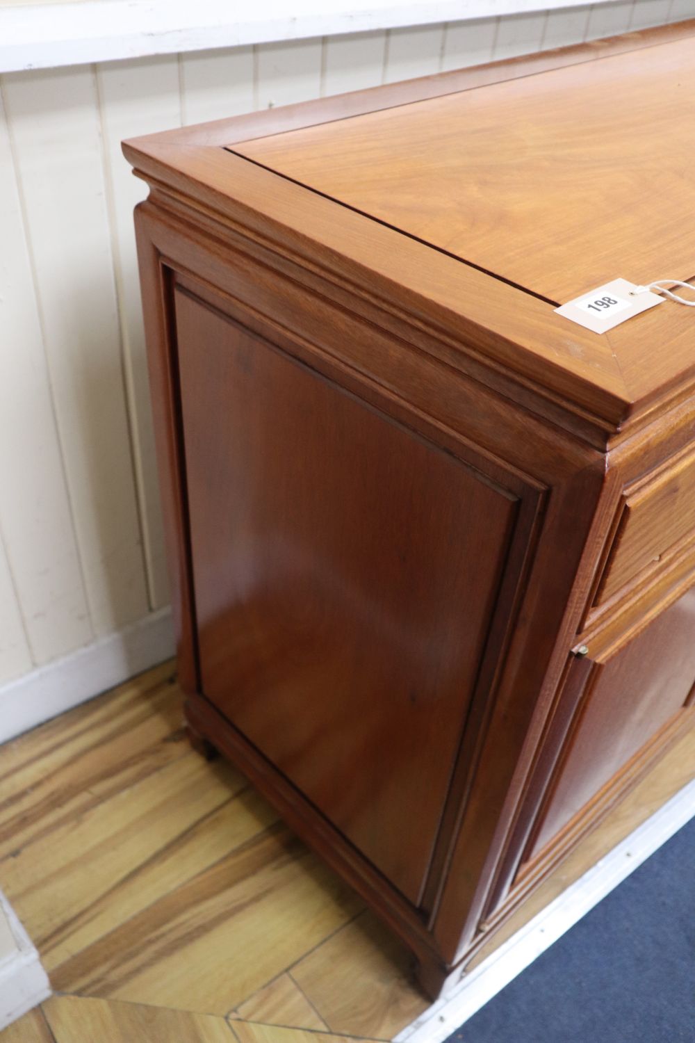 A Chinese hardwood sideboard, width 182cm, depth 48cm, height 82cm